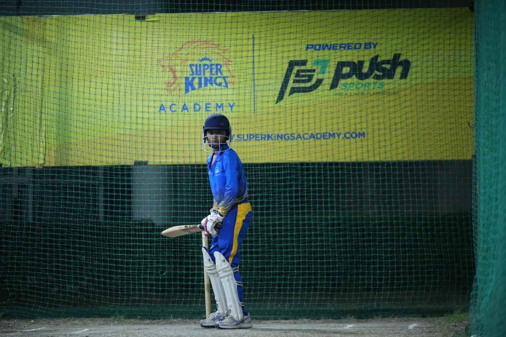Student in batting stance at Super Kings Academy nets